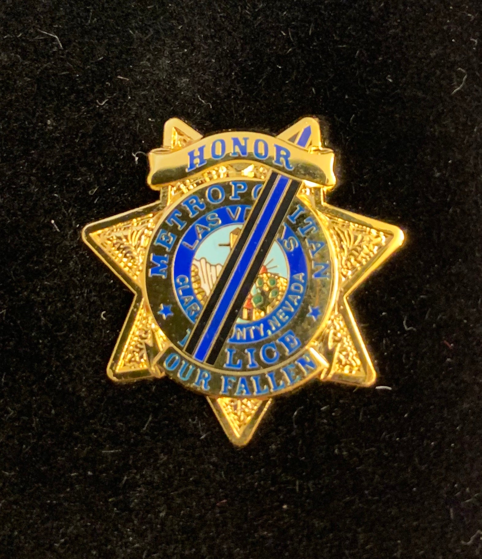 Las Vegas Metropolitan Police Department - L V M P D Badge over